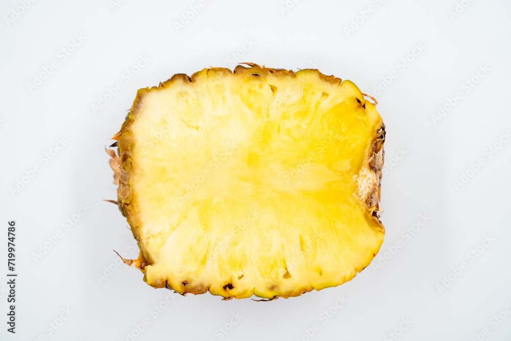 Cut pineapple close up on white background isolated. Cut pineapple close up on white background isolated.