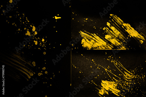 gold paint splatter on a black background