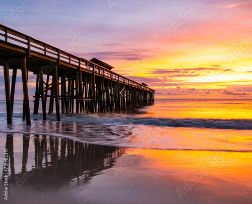 Sunrise and Wooden Pier on Fernandina Beach, Amelia Island, Florida, USA photo