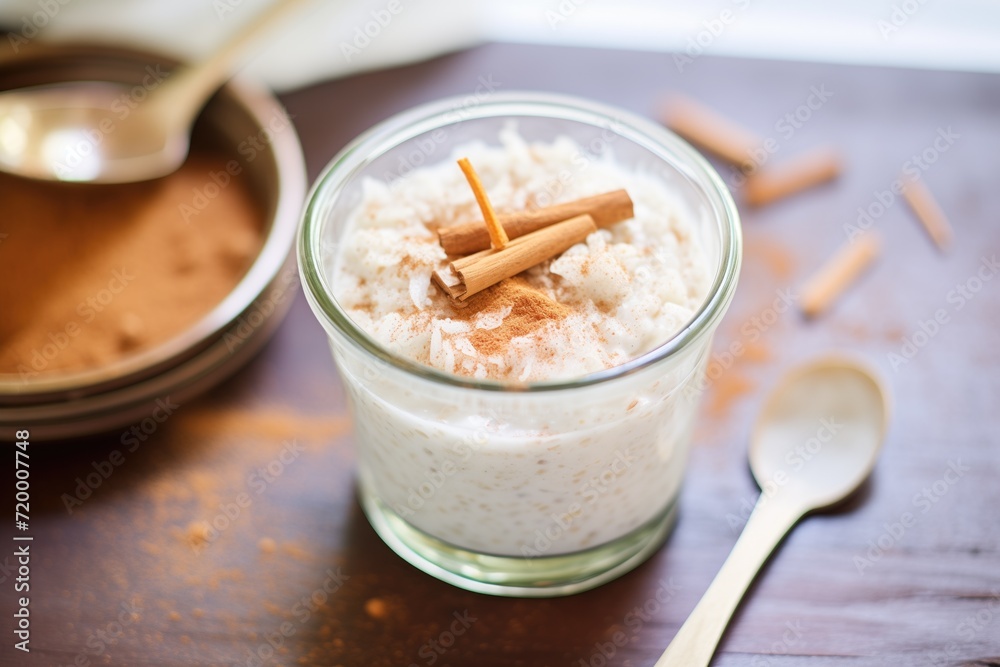 closeup of rice pudding drink with a sprinkle of nutmeg on top closeup of rice pudding drink with a sprinkle of nutmeg on top