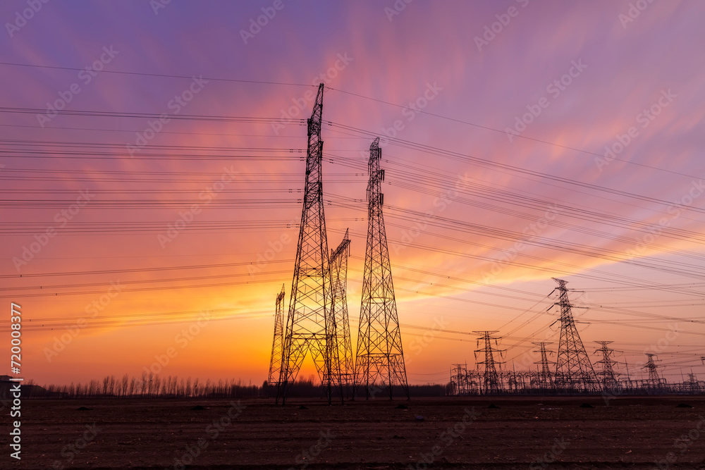 The pylons are in the evening, Substation in the evening, High voltage substation and beautiful sunset glow