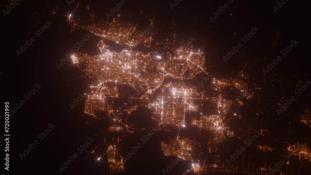 Vancouver (Canada) aerial view at night. Top view on city from space. Camera is zooming in, rotating clockwise