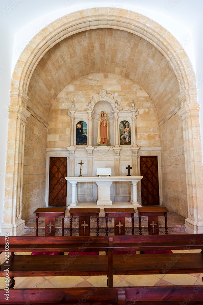Fototapeta premium Galatzo house chapel, dry stone path, GR221, Calvia, Natural area of the Serra de Tramuntana., Majorca, Balearic Islands, Spain