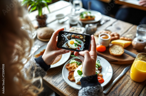 woman taking picture of breakfas Content creators photo