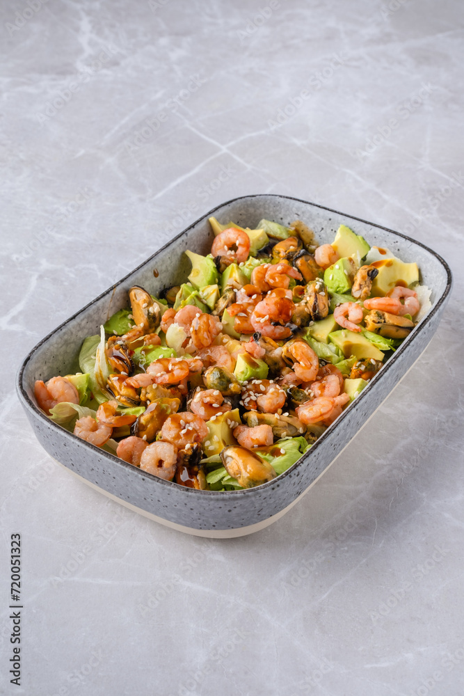 Bowl with salad with shrimp, mussels and avocado Bowl with salad with shrimp, mussels and avocado