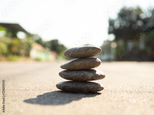 Stone Zen Stack Balance Abstract blur Leaf Background Stability Spa Pyramid Pebble Group Peace Overlay Sunshine nature  Meditation Natural Harmony Aroma Outdoor Relaxtion Massage Japan Health Word.