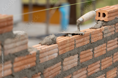 brick block structure construction plaster cement mortar wall in residential building industry photo