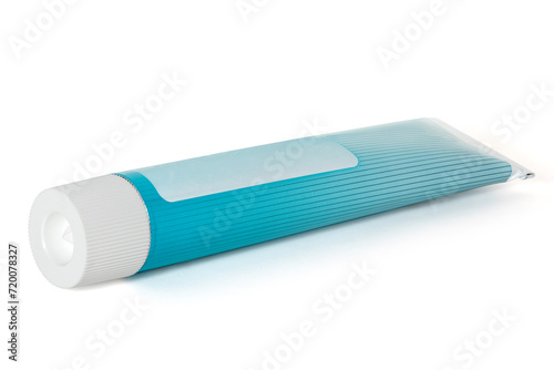 Tube of white and blue color with cap on a white background. Full depth of field. With clipping path