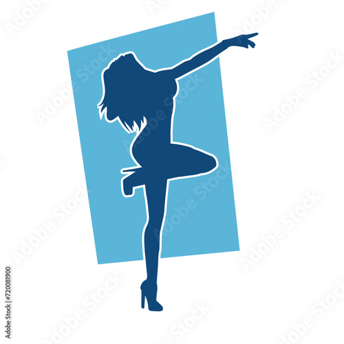 Silhouette of a slim female in dance pose. Silhouette of a woman dancing.