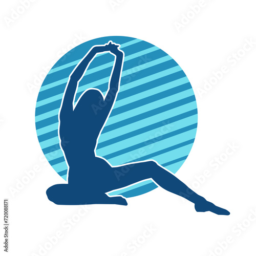 Silhouette of a sexy female doing seductive dance
