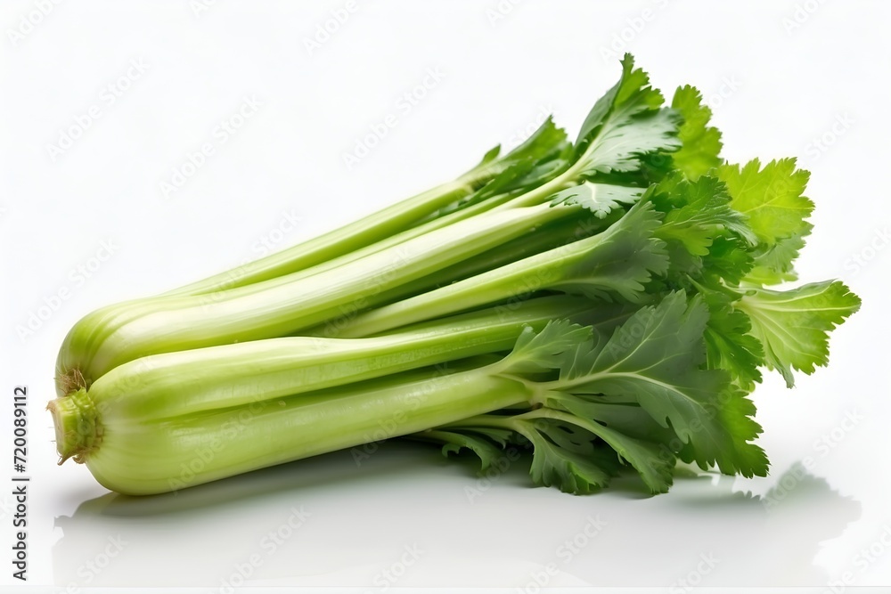 Celery on a white background, close-up. Celery on a white background, close-up.