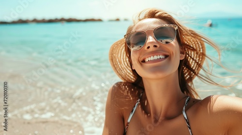 Smiling Woman Enjoying the Sun on the Seashore © esp2k
