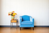 bright blue armchair with metal accents in corner