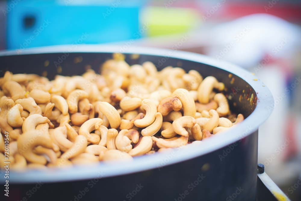 closeup of cashew nuts during oil extraction closeup of cashew nuts during oil extraction