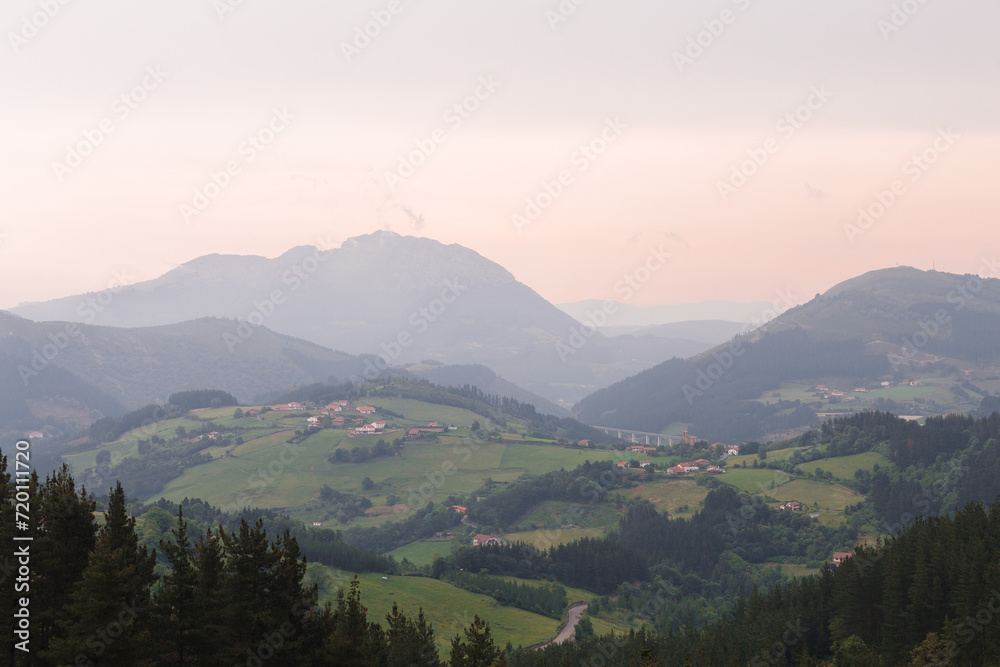 Fototapeta premium green mountains and village