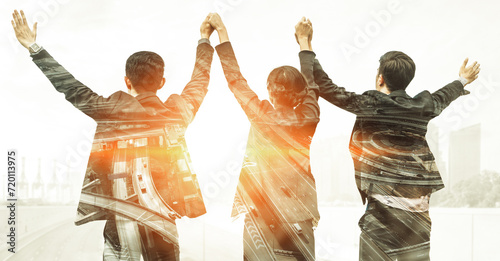 Photos Double exposure image of many business people conference group meeting on city office building in background showing partnership success of business deal