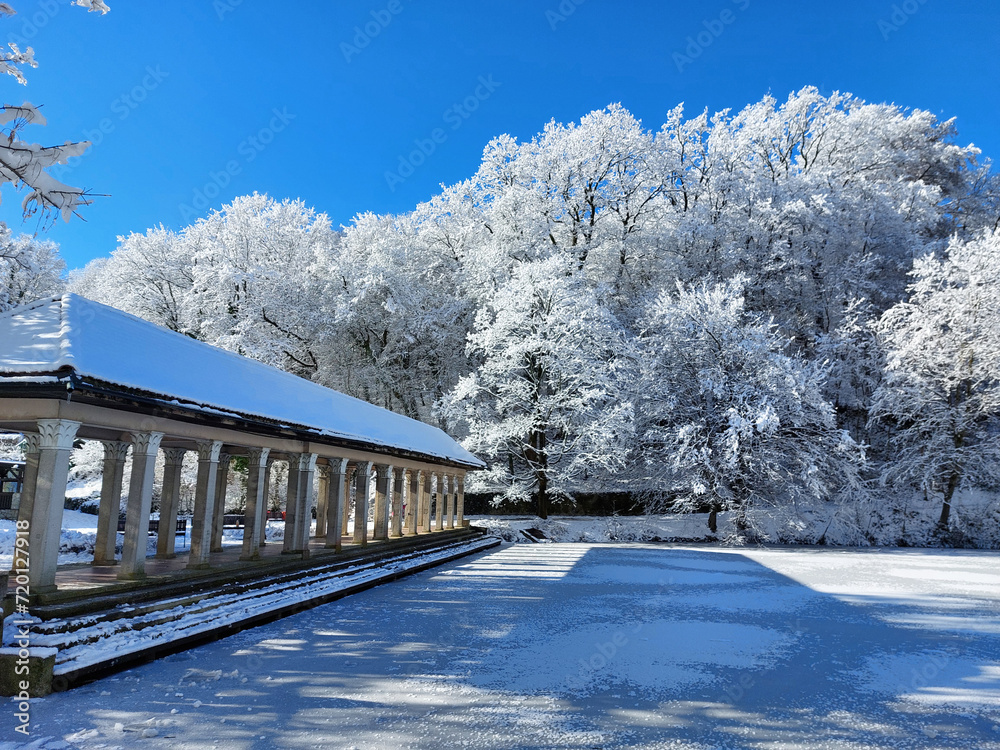 winter park with white trees and frozen lake. Sunny day. Wintertime. Maribor