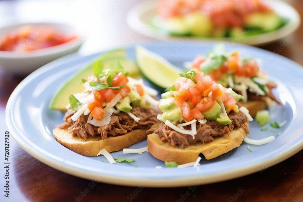 molletes with refried beans and cheese on openfaced rolls molletes with refried beans and cheese on openfaced rolls
