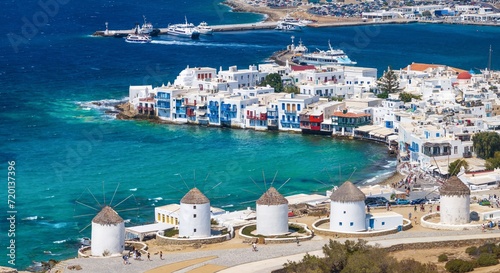 Photography Aerial close-up view through the famous windmills above Mykonos town, Cyclades,
