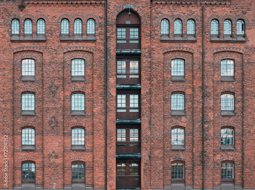 windows of an old red brick building in Hamburg city