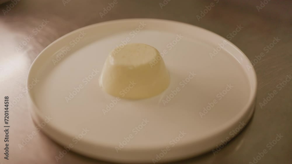 Making Dessert In Kitchen In Restaurant. Cook Puts White Jelly On Plate. Making Dessert In Kitchen In Restaurant. Cook Puts White Jelly On Plate.