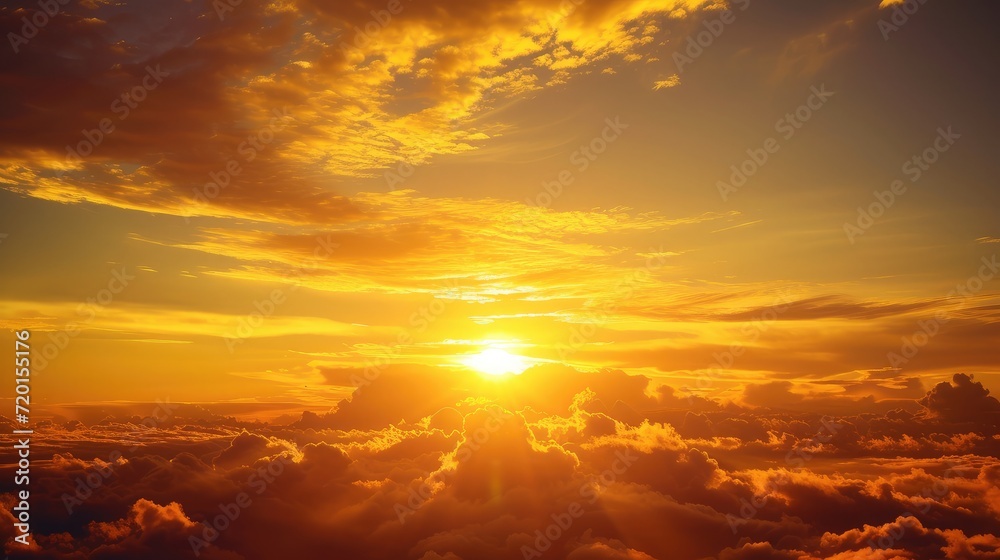 Fototapeta premium The morning sky looked like a bright golden sky. The sunrise is decorated with clouds in various shapes. Looks beautiful.