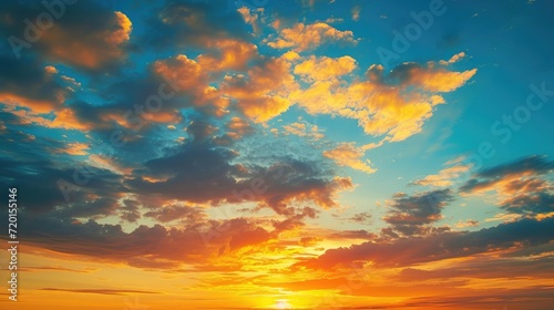 Sunset Sky on Twilight in the Evening with Orange Gold Sunset Cloud Nature Sky Background, Horizon Golden Sky, Sunrise clouds Gorgeous, Dusk sky © buraratn
