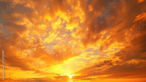 The morning sky looked like a bright golden sky. The sunrise is decorated with clouds in various shapes. Looks beautiful.