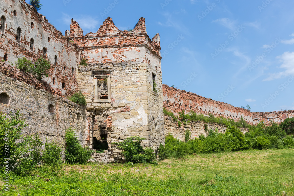 Ruins of brick defense tower and wall of mediaeval castle
