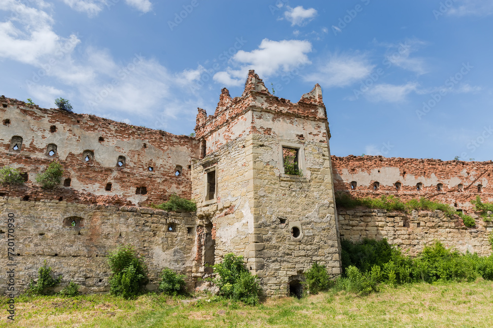 Ruins of brick defense tower and wall of mediaeval castle