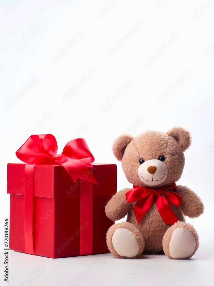 Teddy bear toy and red gift box on white background. Teddy bear toy and red gift box on white background.