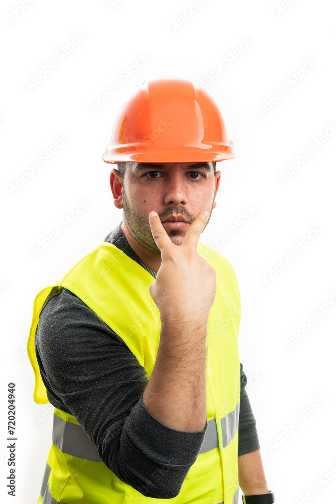 Constructor man making eye-contact gesture as supervisor concept Constructor man making eye-contact gesture as supervisor concept