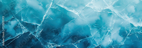 Beautiful winter natural blue ice texture of surface of frozen. Nature abstract pattern of white cracks. Winter seasonal background, mock up, flat lay, ice texture background,ice banner	
 photo