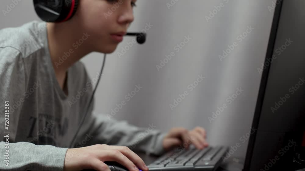 Gamer boy playing computer game., close-up Gamer boy playing computer game., close-up