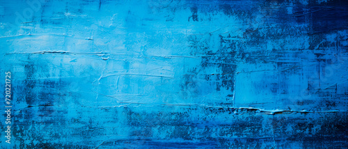 Bright blue abstract wall, textured like organic landscapes. Monochromatic depth, distressed surfaces, ideal for large canvas paintings. Realistic, industrial texture