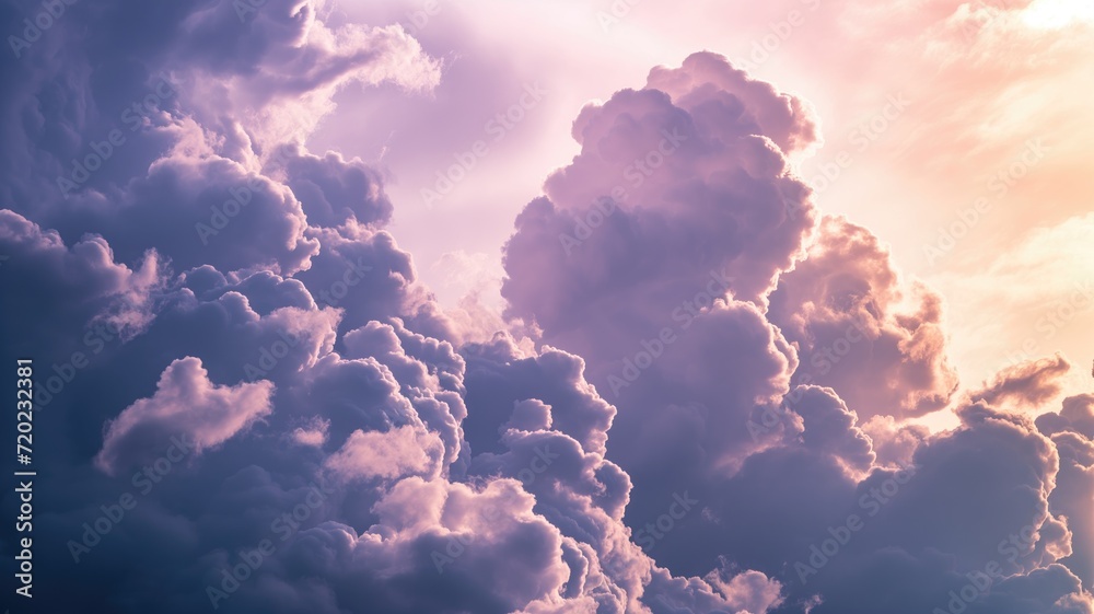 A mesmerizing cloudscape with deep purple tones at dusk - obrazy, fototapety, plakaty 