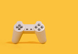 Gray retro joystick on a yellow background. Copy space for text.