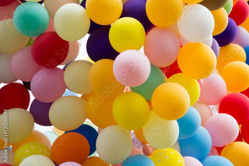 Balloons with colorful light effects creating a rainbow spectrum