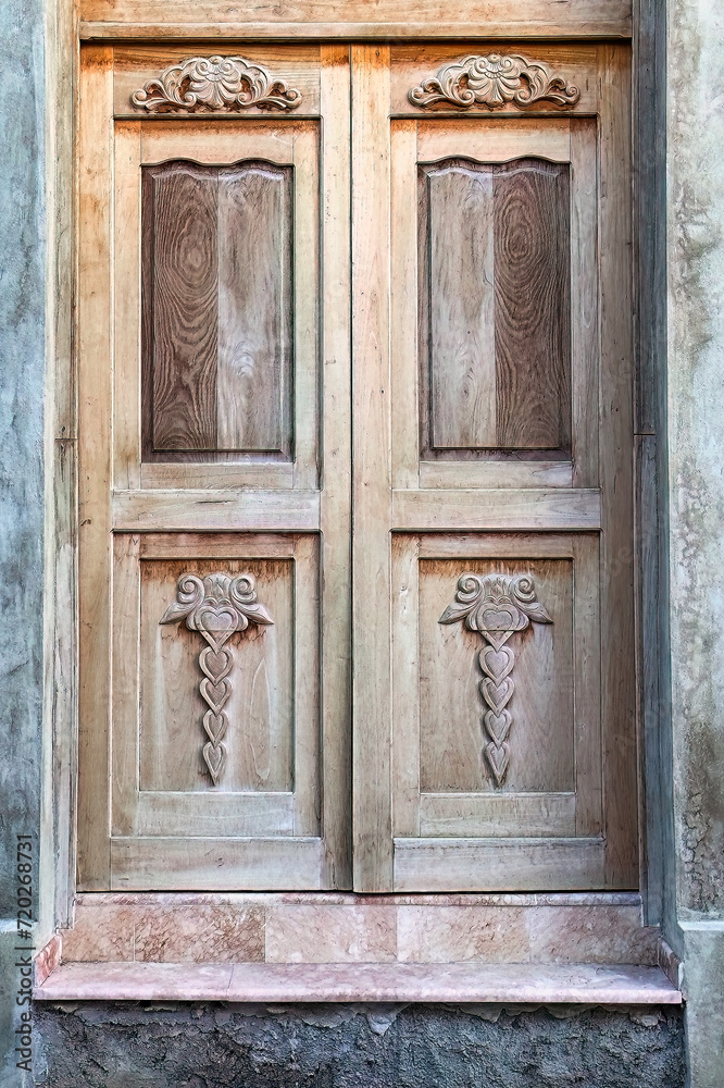 New woodwork in a door of an unfinished house in Cuba