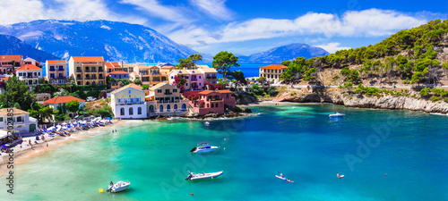 Fototapeta Naklejka Na Ścianę i Meble -  Greece  travel. One of the most beautiful traditional greek villages - scenic Assos in Kefalonia (Cephalonia) with colorful floral streets. Ionian islands , popular tourist destination