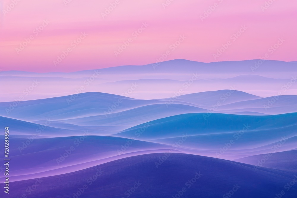 A stunning sunrise paints the sky with hues of purple and blue, illuminating the fog that blankets the rolling hills and mountains in this breathtaking outdoor landscape