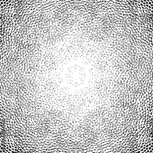 Textured reptilian skin with small parts of ink blots in a circular shape. Monochrome grunge texture with bright tones in the center of the composition.