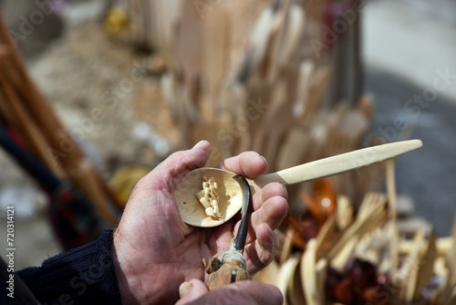 Process of making a carved wooden spoon on hand