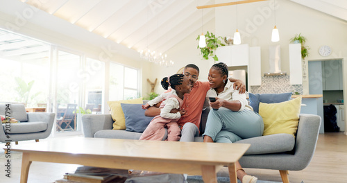 Support, black family on sofa and in living room of their home happy together smiling. Support or care, happiness or bonding time and African people cuddle on couch in their house for positivity photo