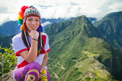 Peruvian woman on top of Huaynapicchu mountain, Cusco Peru photo