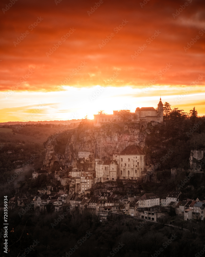 Sun setting over the medieval city of Rocamaour in the Lot region of France Sun setting over the medieval city of Rocamaour in the Lot region of France