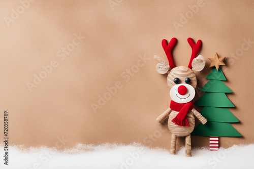 Cute reindeer Christmas image made of craft material with copy space
