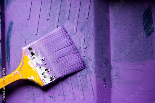 Brush the variegated color paint onto the weathered wooden plank wall