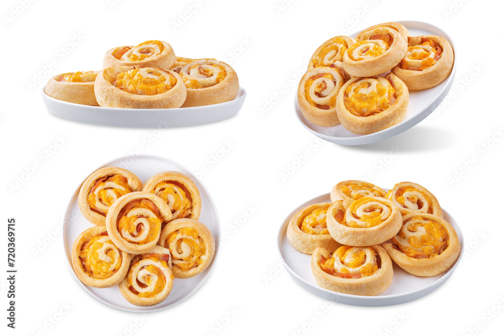 Bacon Cheddar cheese roll cake pinwheel on a white isolated background Bacon Cheddar cheese roll cake pinwheel on a white isolated background
