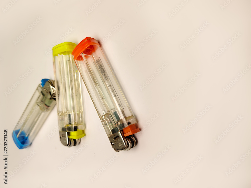 Naklejka premium three colorful matches, orange, blue and green on a white background